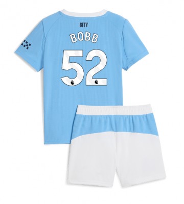 Manchester City Oscar Bobb #52 Primera Equipación Niños 2025-26 Manga Corta (+ Pantalones cortos)